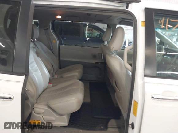 2012 Toyota Sienna XLE AAS z VIN 5TDYK3DC2CS196897, wystawiony jako IAAI lot #41762345 z przebiegiem 183 188 mil mil oraz . Historia ofert i sprzedaży dostępna na DreamBid. Obrazek 8.