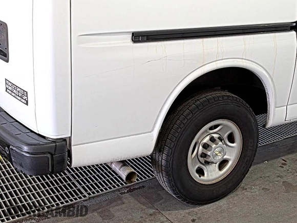 2021 Chevrolet Express Cargo with VIN 1GCWGAFP2M1303152, listed as a IAAI auction lot 42672934 with 68,671 mi miles and . Bid and sale history available at DreamBid. Image 7.