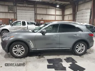 2017 Infiniti QX70 z VIN JN8CS1MU3HM143799, wystawiony jako IAAI lot #41554527 z przebiegiem 70 453 mil mil oraz . Historia ofert i sprzedaży dostępna na DreamBid. Obrazek 14.