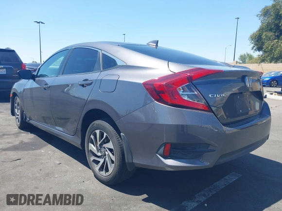 2018 Honda Civic EX с VIN 2HGFC2F76JH600117, выставлен на аукционе IAAI как лот 42131831 с пробегом 156 491 миль миль и . История ставок и продаж доступна на DreamBid. Изображение 3.