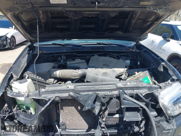 2018 Toyota Tacoma SR5 z VIN 3TMDZ5BN0JM051283, wystawiony jako IAAI lot #42008928 z przebiegiem 106 155 mil mil oraz . Historia ofert i sprzedaży dostępna na DreamBid. Obrazek 10.