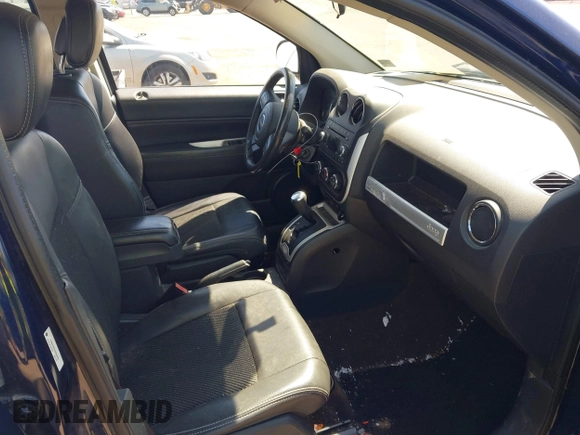 2014 Jeep Compass Latitude with VIN 1C4NJCEB2ED883243, listed as a IAAI auction lot 41989007 with 138,192 mi miles. Bid and sale history available at carsss.com. Image 5.