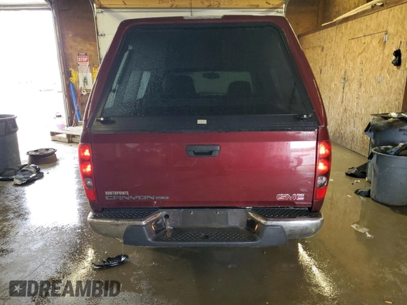 2009 GMC Canyon Work Truck with VIN 1GTCS149098128985, listed as a Copart auction lot 60897045 with 123,843 mi miles and Salvage title. Bid and sale history available at DreamBid. Image 6.