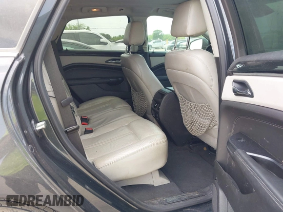 2014 Cadillac SRX Luxury Collection with VIN 3GYFNBE33ES599058, listed as a IAAI auction lot 42080556 with 128,917 mi miles. Bid and sale history available at carsss.com. Image 8.