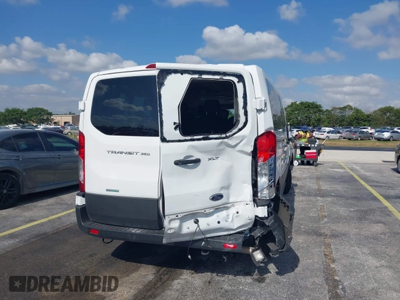 2023 Ford Transit Passenger XL with VIN 1FBAX2YG6PKB08879, listed as a IAAI auction lot 42137671 with 44,204 mi miles. Bid and sale history available at carsss.com. Image 6.