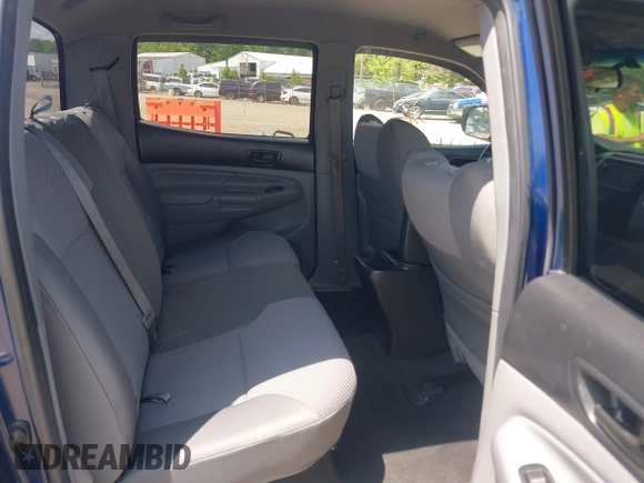 2015 Toyota Tacoma with VIN 3TMLU4EN1FM187705, listed as a IAAI auction lot 42119222 with 115,471 mi miles and . Bid and sale history available at DreamBid. Image 8.