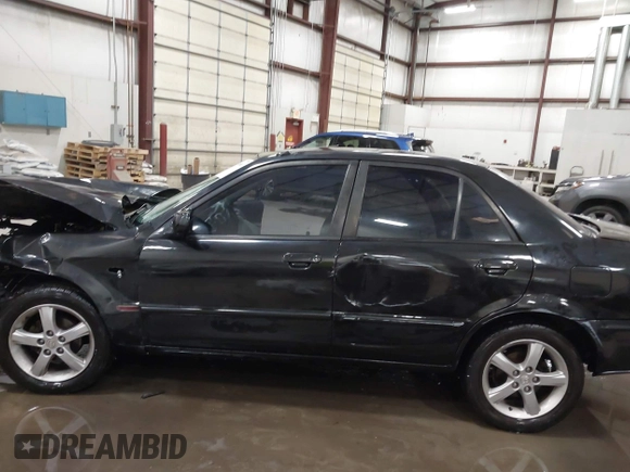 2003 Mazda Protege DX with VIN JM1BJ226431112902, listed as a IAAI auction lot 41939907 with 184,618 mi miles and . Bid and sale history available at DreamBid. Image 15.