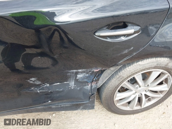 2017 Infiniti Q50 Premium z VIN JN1EV7AP7HM738414, wystawiony jako IAAI lot #42666640 z przebiegiem 79 888 mil mil oraz . Historia ofert i sprzedaży dostępna na DreamBid. Obrazek 6.