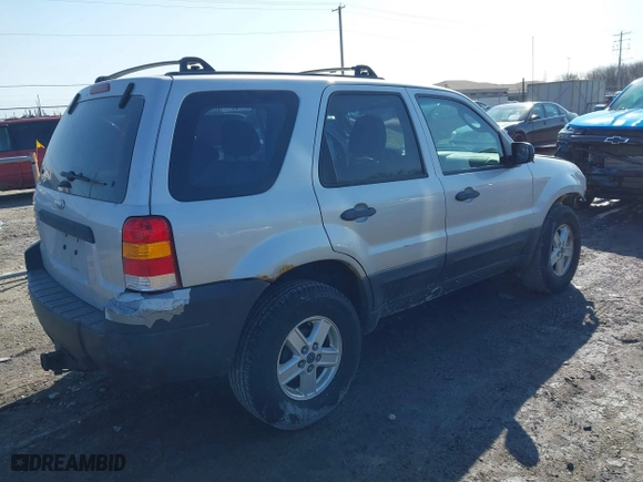 2007 Ford Escape XLS with VIN 1FMYU92Z87KA05657, listed as a IAAI auction lot 41723701 with 152,713 mi miles. Bid and sale history available at carsss.com. Image 4.