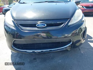 2011 Ford Fiesta SES with VIN 3FADP4FJ9BM181965, listed as a IAAI auction lot 42092140 with 150,304 mi miles. Bid and sale history available at carsss.com. Image 18.