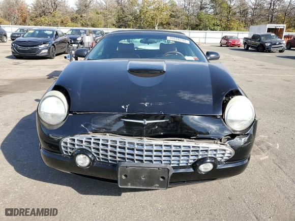 2003 Ford Thunderbird Deluxe with VIN 1FAHP60A63Y104093, listed as a Copart auction lot 76028744 with 79,995 mi miles and Salvage Title. Bid and sale history available at carsss.com. Image 5.