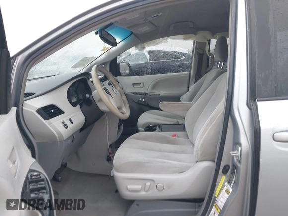 2014 Toyota Sienna LE AAS with VIN 5TDKK3DC9ES501255, listed as a IAAI auction lot 42096386 with 347,364 mi miles and . Bid and sale history available at carsss.com. Image 5.