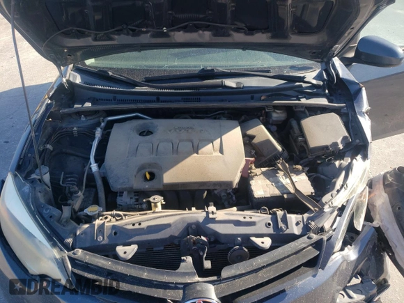 2014 Toyota Corolla L z VIN 2T1BURHE5EC096772, wystawiony jako Copart lot #61575285 z przebiegiem 228 755 mil mil oraz Szkoda całkowita • Salvage title. Historia ofert i sprzedaży dostępna na DreamBid. Obrazek 11.