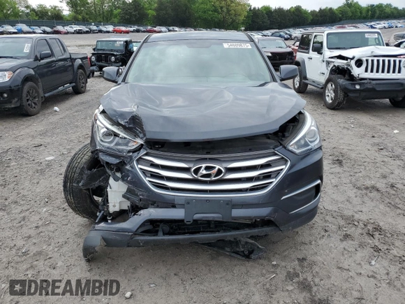 2018 Hyundai Santa Fe 2.4L z VIN 5XYZTDLB4JG553426, wystawiony jako Copart lot #54609875 z przebiegiem 93 328 mil mil oraz Szkoda całkowita • Salvage title. Historia ofert i sprzedaży dostępna na DreamBid. Obrazek 5.