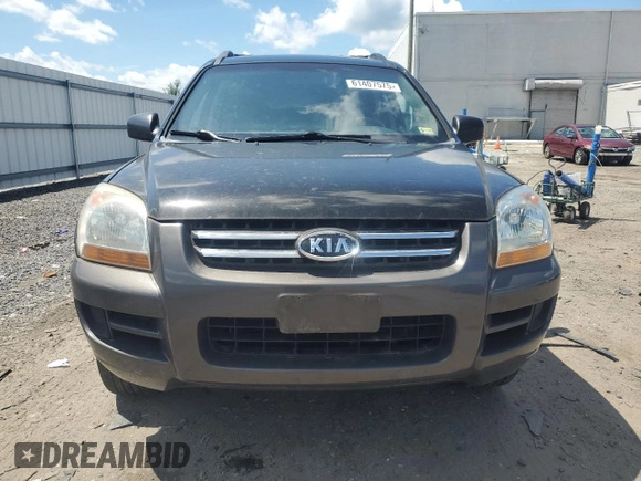 2005 Kia Sportage LX z VIN KNDJE723657121717, wystawiony jako Copart lot #61407575 z przebiegiem Nie podano mil oraz Czysty tytuł • Clean title. Historia ofert i sprzedaży dostępna na DreamBid. Obrazek 5.