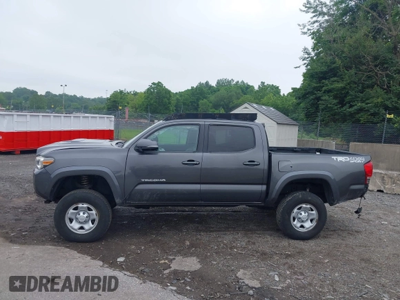 2017 Toyota Tacoma SR5 with VIN 3TMCZ5ANXHM089093, listed as a IAAI auction lot 42513711 with 86,022 mi miles and . Bid and sale history available at DreamBid. Image 14.