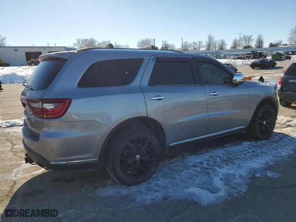 2015 Dodge Durango Citadel with VIN 1C4RDJEG7FC799354, listed as a Copart auction lot 87958385 with 217,849 mi miles and Salvage Title. Bid and sale history available at carsss.com. Image 3.