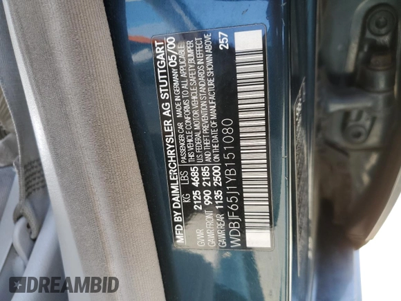2000 Mercedes-Benz E-Class with VIN WDBJF65J1YB151080, listed as a Copart auction lot 54421955 with 392,612 mi miles and Salvage Title. Bid and sale history available at carsss.com. Image 14.
