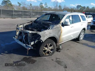2012 Dodge Durango Crew with VIN 1C4RDHDG1CC158481, listed as a IAAI auction lot 41240405 with 181,490 mi miles and . Bid and sale history available at DreamBid. Image 2.