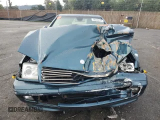 2000 Mercedes-Benz SL-Class with VIN WDBFA68F2YF189776, listed as a Copart auction lot 86550124 with 107,479 mi miles and Salvage Title. Bid and sale history available at carsss.com. Image 5.