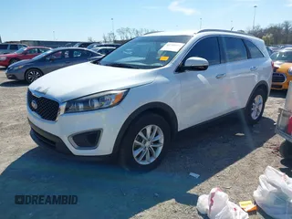 2016 Kia Sorento LX with VIN 5XYPG4A39GG106459, listed as a IAAI auction lot 41790974 with 107,994 mi miles. Bid and sale history available at carsss.com. Image 2.