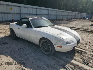 1991 Mazda MX-5 Miata Special Edition z VIN JM1NA3515M0231262, wystawiony jako Copart lot #57221675 z przebiegiem 241 670 mil mil oraz Szkoda całkowita • Salvage title. Historia ofert i sprzedaży dostępna na DreamBid. Obrazek 4.