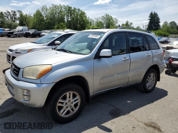 2003 Toyota RAV4 with VIN JTEGH20V936012689, listed as a Copart auction lot 61997965 with 214,693 mi miles and Clean title. Bid and sale history available at DreamBid. Image 1.