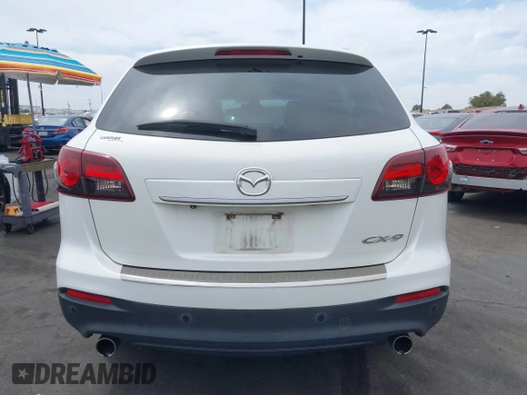 2015 Mazda CX-9 Grand Touring z VIN JM3TB2DV9F0458340, wystawiony jako IAAI lot #42021843 z przebiegiem 145 929 mil mil oraz . Historia ofert i sprzedaży dostępna na DreamBid. Obrazek 17.