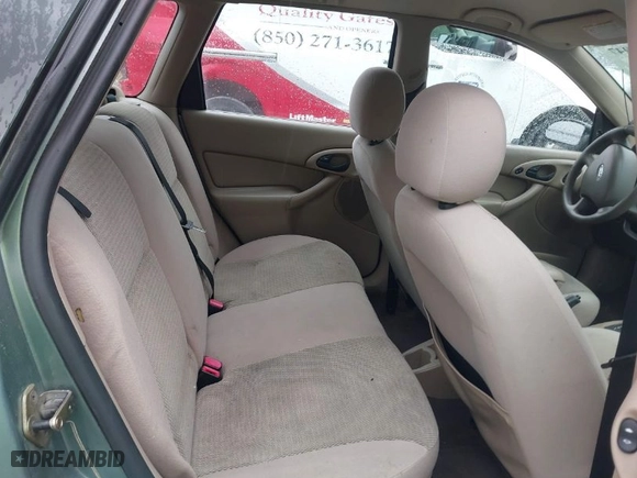 2004 Ford Focus SE with VIN 1FAFP36Z34W152554, listed as a IAAI auction lot 41964947 with 214,886 mi miles. Bid and sale history available at carsss.com. Image 8.