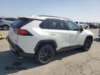 2022 Toyota RAV4 Hybrid SE with VIN 2T3T6RFV8NW034399, listed as a Copart auction lot 60249015 with 39,495 mi miles and Salvage title. Bid and sale history available at DreamBid. Image 3.