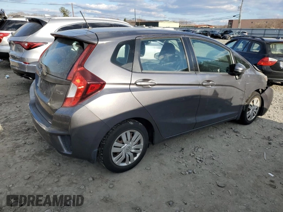 2015 Honda Fit LX with VIN 3HGGK5H51FM714796, listed as a Copart auction lot 83174244 with 121,690 mi miles and Salvage Title. Bid and sale history available at carsss.com. Image 3.