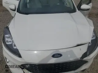 2020 Ford Escape Titanium z VIN 1FMCU9J9XLUB57675, wystawiony jako Copart lot #57777795 z przebiegiem Nie podano mil oraz Szkoda całkowita • Salvage title. Historia ofert i sprzedaży dostępna na DreamBid. Obrazek 12.