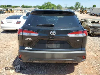 2023 Toyota Corolla Cross LE with VIN 7MUCAAAG3PV058094, listed as a Copart auction lot 57983105 with 30,593 mi miles and Salvage title. Bid and sale history available at DreamBid. Image 6.