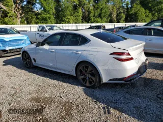 2023 Genesis G70 3.3T with VIN KMTG54TE3PU113251, listed as a Copart auction lot 52675895 with 20,969 mi miles and Salvage title. Bid and sale history available at DreamBid. Image 2.