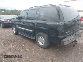 2003 GMC Yukon SLT with VIN 1GKEC13Z43J327937, listed as a IAAI auction lot 41543517 with 277,485 mi miles. Bid and sale history available at carsss.com. Image 3.