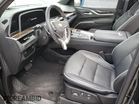 2023 Cadillac Escalade 4WD Premium Luxury with VIN 1GYS4BKL5PR388049, listed as a Copart auction lot 54626395 with 28,152 mi miles and Salvage title. Bid and sale history available at DreamBid. Image 7.