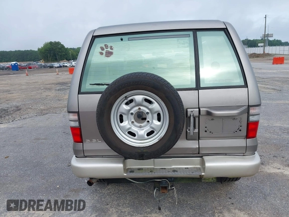 2002 Isuzu Trooper S with VIN JACDJ58X527J07745, listed as a IAAI auction lot 42714673 with 122,482 mi miles and . Bid and sale history available at DreamBid. Image 16.