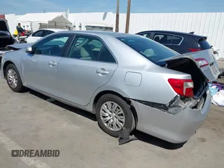 2013 Toyota Camry L with VIN 4T4BF1FKXDR313627, listed as a IAAI auction lot 41855022 with 128,782 mi miles. Bid and sale history available at carsss.com. Image 3.