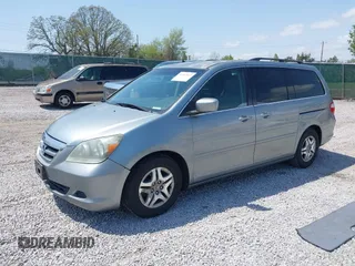 2007 Honda Odyssey EX with VIN 5FNRL38457B042912, listed as a IAAI auction lot 41992847 with 194,822 mi miles and . Bid and sale history available at DreamBid. Image 2.