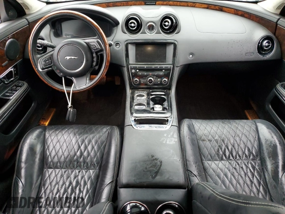 2016 Jaguar XJ Portfolio with VIN SAJWJ2GD8G8W02010, listed as a Copart auction lot 79011404 with Not Provided miles and Salvage Title. Bid and sale history available at DreamBid. Image 8.