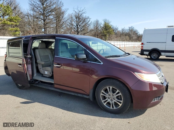 2012 Honda Odyssey EX-L with VIN 5FNRL5H67CB084585, listed as a Copart auction lot 52854525 with 108,015 mi miles and Salvage Title. Bid and sale history available at carsss.com. Image 4.
