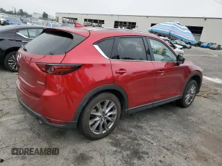 2020 Mazda CX-5 Grand Touring with VIN JM3KFADM1L1837775, listed as a Copart auction lot 55314595 with 82,359 mi miles and Clean Title. Bid and sale history available at DreamBid. Image 3.