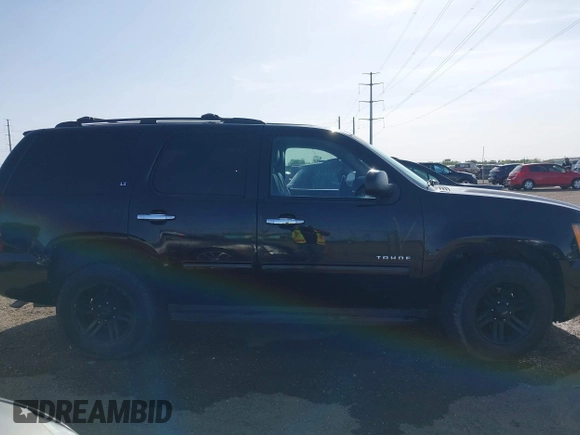 2011 Chevrolet Tahoe LT z VIN 1GNSCBE01BR160656, wystawiony jako IAAI lot #41822149 z przebiegiem 248 195 mil mil oraz . Historia ofert i sprzedaży dostępna na DreamBid. Obrazek 12.