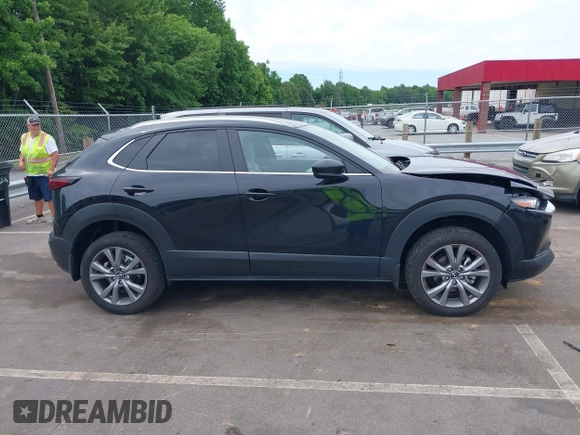 2024 Mazda CX-30 S Preferred z VIN 3MVDMBCM3RM663118, wystawiony jako IAAI lot #42336540 z przebiegiem 11 096 mil mil oraz . Historia ofert i sprzedaży dostępna na DreamBid. Obrazek 13.