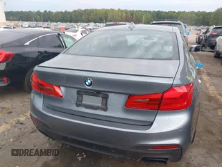 2018 BMW 5 Series M550i xDrive with VIN WBAJB9C53JB286035, listed as a IAAI auction lot 40590380 with 57,072 mi miles and . Bid and sale history available at carsss.com. Image 16.