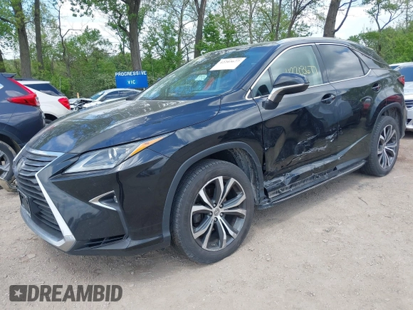 2017 Lexus RX 350 with VIN 2T2BZMCA8HC066061, listed as a IAAI auction lot 42203677 with 165,618 mi miles and . Bid and sale history available at DreamBid. Image 6.