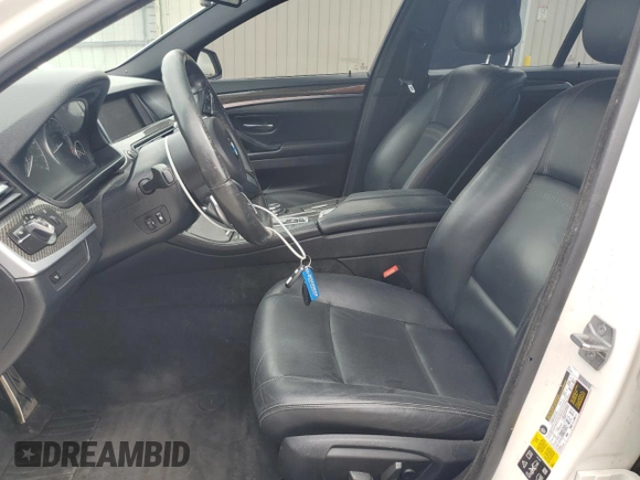2016 BMW 5 Series 535i xDrive with VIN WBA5B3C57GG259768, listed as a Copart auction lot 63640625 with 97,584 mi miles and Salvage title. Bid and sale history available at DreamBid. Image 7.