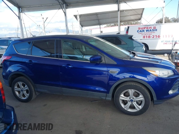 2016 Ford Escape SE with VIN 1FMCU9GX2GUC89275, listed as a IAAI auction lot 41937354 with 140,362 mi miles. Bid and sale history available at carsss.com. Image 13.