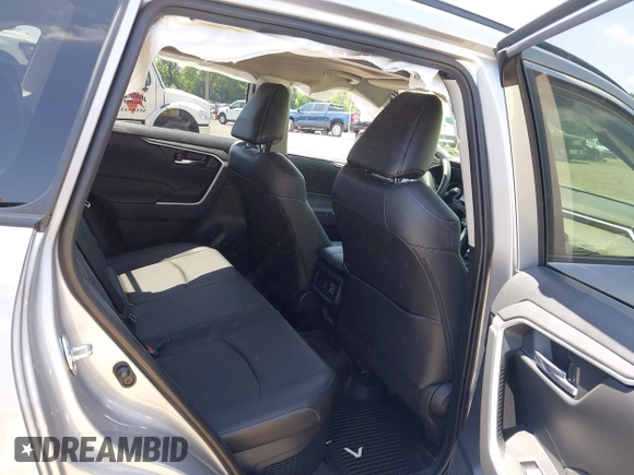 2022 Toyota RAV4 Hybrid XLE Premium with VIN JTMB6RFV1ND063963, listed as a IAAI auction lot 42550907 with 35,012 mi miles and . Bid and sale history available at DreamBid. Image 8.