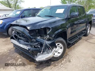 2022 Toyota Tacoma SR with VIN 3TYCZ5AN0NT074683, listed as a IAAI auction lot 42117875 with 51,112 mi miles and . Bid and sale history available at DreamBid. Image 6.